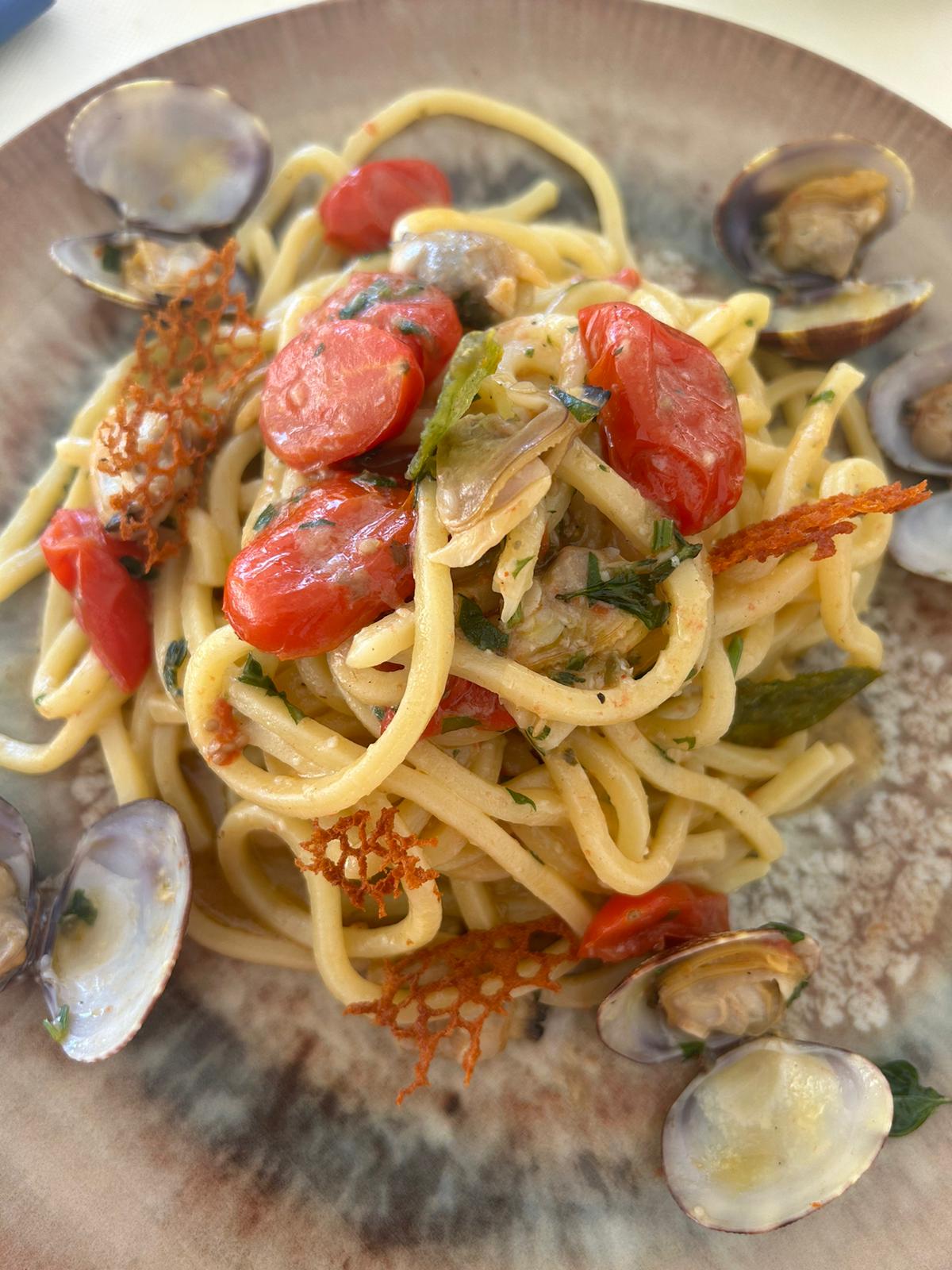 Spaghetti con vongole e pomodorini