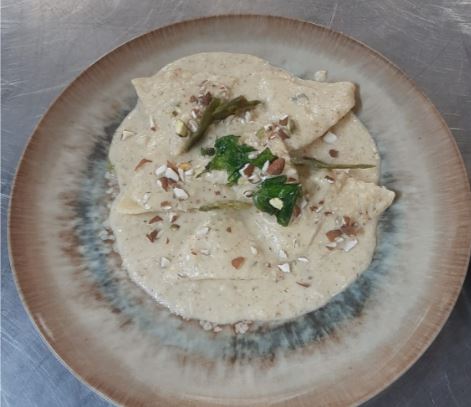 Ravioli di pesce con pesto di limone e mandorle